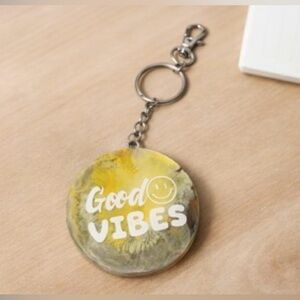 Yellow and Gray Key Holder with 'Good Vibes' Design